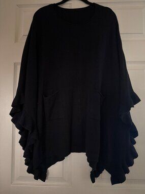 Black Knit Poncho With Ruffle Hem & Front Pockets